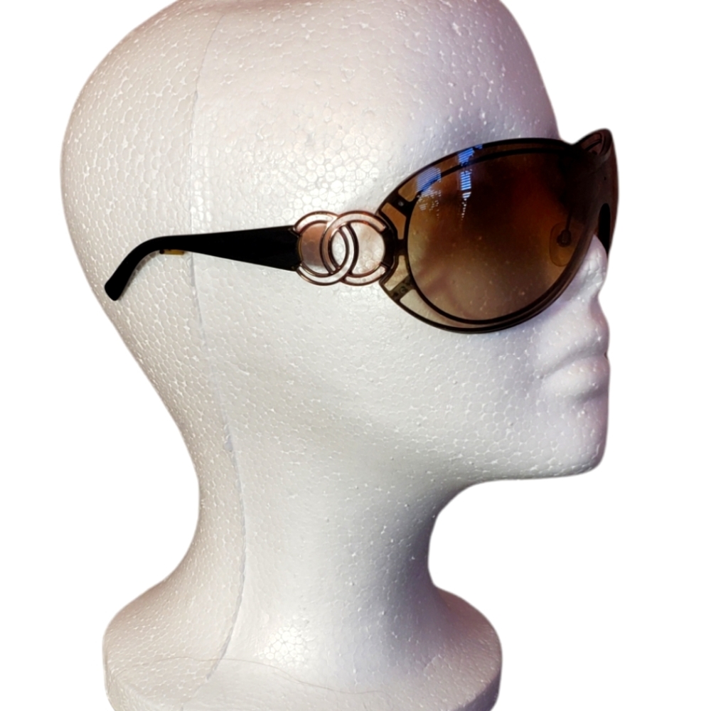CHANEL Black Frames with Brown Gradient Lenses and Gold CC Accent Sunglasses.